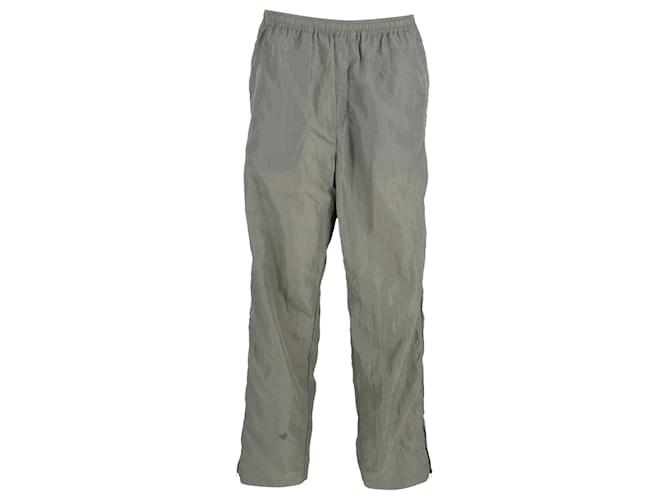 Pantaloni sportivi a conchiglia con zip e dettagli in velluto di Acne Studios in nylon verde Cachi