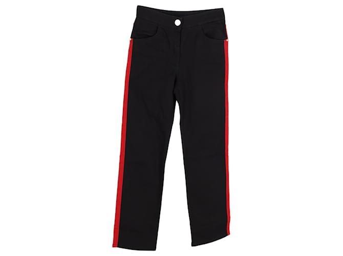 Jeans in denim Balmain con striscia rossa in cotone nero