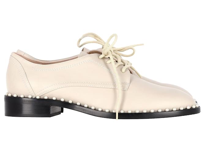 Brogues in pelle nuda con accento di perla Stuart Weitzman Marrone Carne