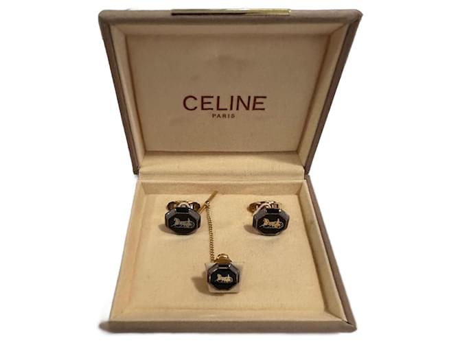 Céline Gemelli e spilla per cravatta Celine