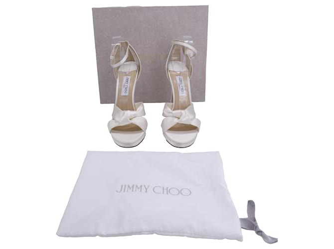 Sandali con cinturino alla caviglia Rosie di Jimmy Choo in raso avorio Bianco Crudo