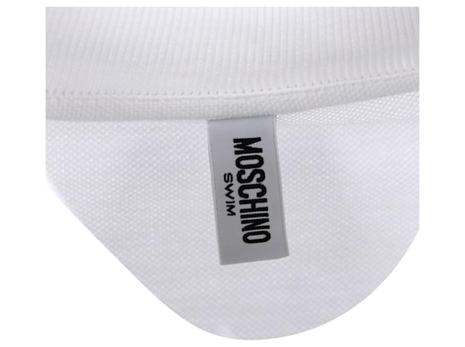 Polo in cotone bianco con patch logo Moschino