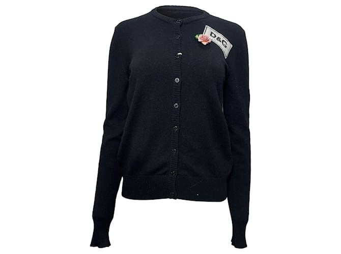 Cardigan in lana nera con logo Dolce & Gabbana e spilla a forma di fiore Nero