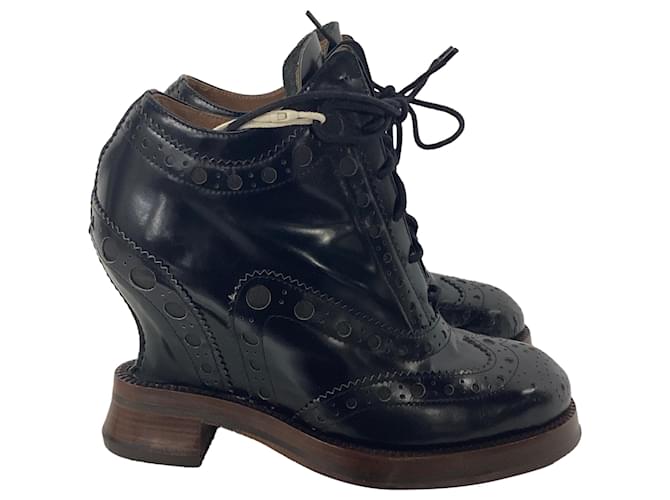 Stivali wedge brogue Spin in pelle nera di Acne Studios Nero
