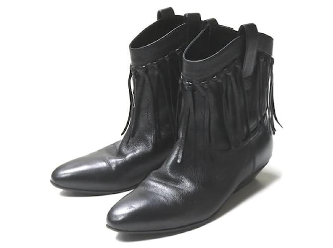 Yves Saint Laurent Stivali western in pelle con frange Saint Laurent
