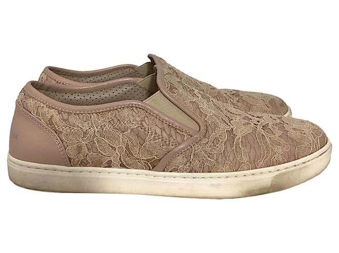 Sneakers slip-on in pelle rosa con dettagli in pizzo Dolce & Gabbana