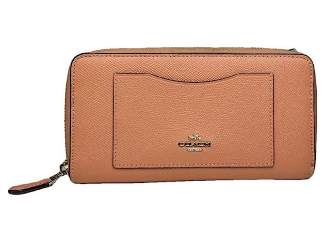 Portafoglio in pelle arancione Coach