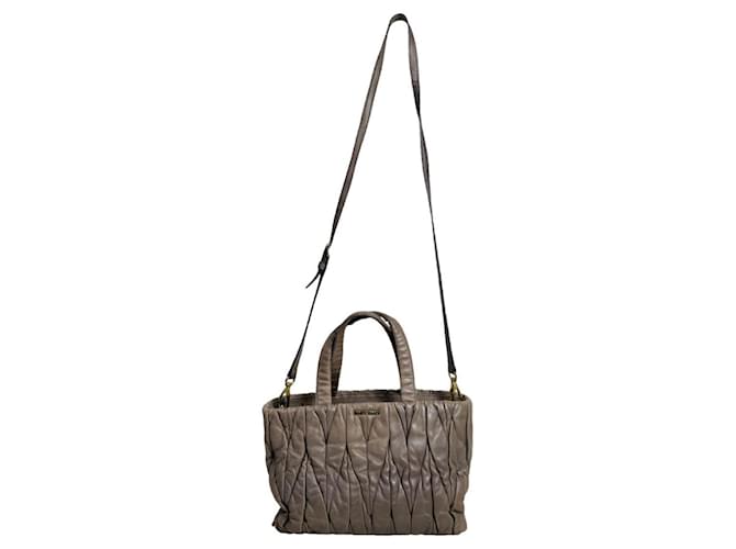 Borsa a mano in pelle matelassé viola Miu Miu Porpora